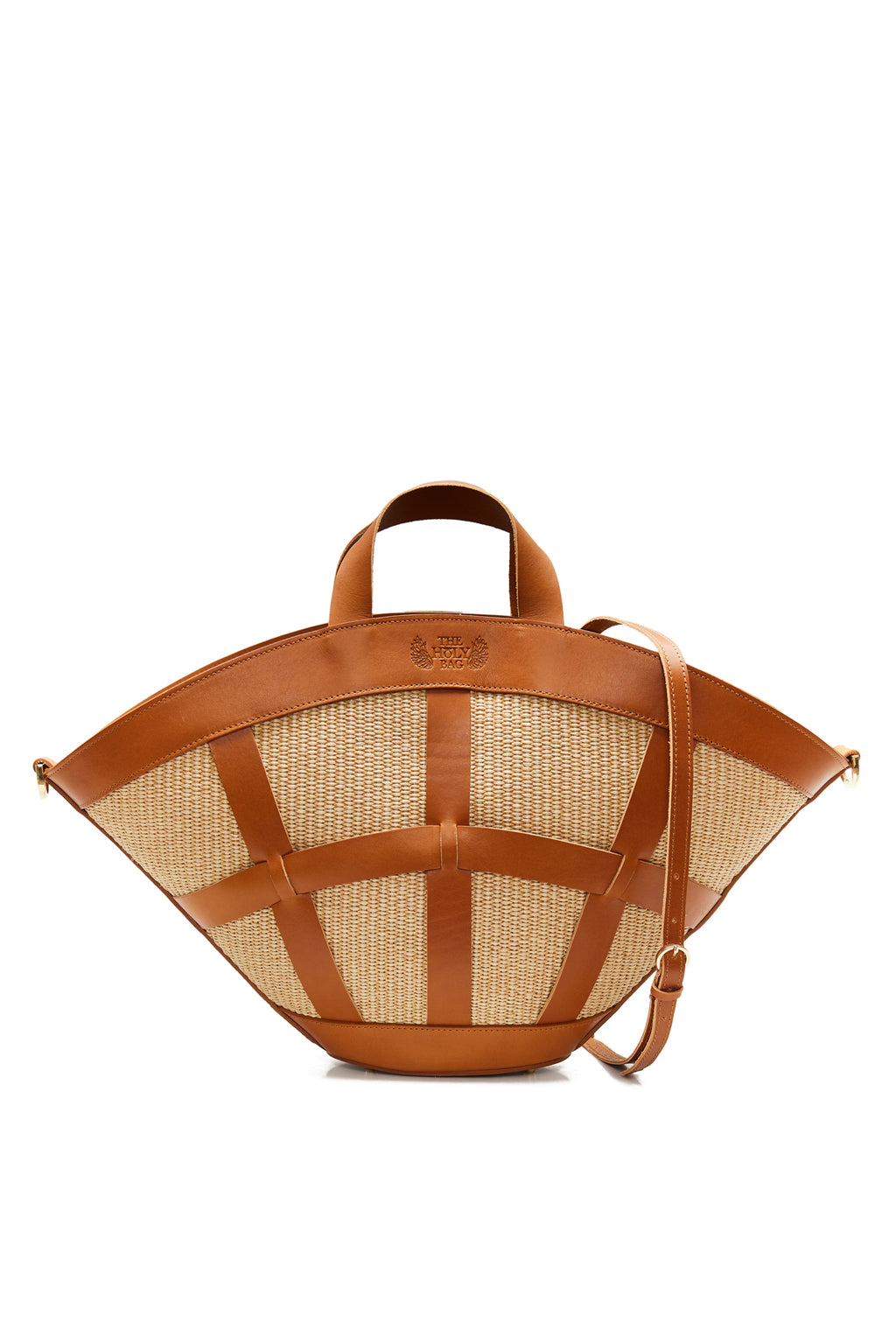 Shopper bag in natural straw and tabac leather knitted straps. Two top handles, inner pockets and an adjustable shoulder strap. Handmade in Athens, Greece The Holy Bag
Χειροποίητη shopper γυναικεια τσάντα από ψάθα και δέρμα με top handles και αποσπώμενο λουράκι ώμου.  The Holy Bag