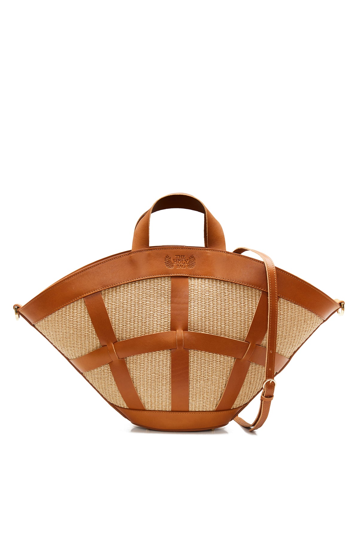 Shopper bag in natural straw and tabac leather knitted straps. Two top handles, inner pockets and an adjustable shoulder strap. Handmade in Athens, Greece The Holy Bag
Χειροποίητη shopper γυναικεια τσάντα από ψάθα και δέρμα με top handles και αποσπώμενο λουράκι ώμου.  The Holy Bag