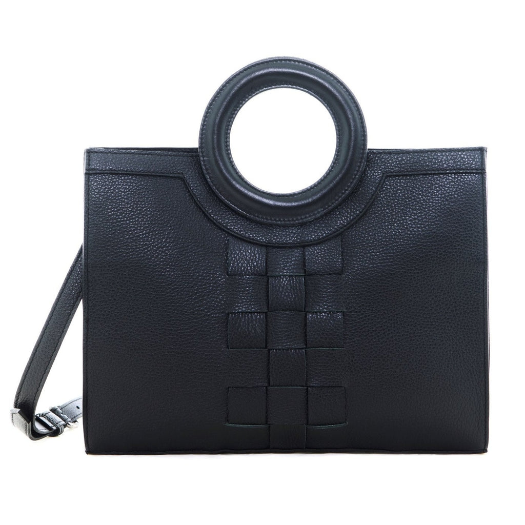 EUTERPE - The Holy Bag tote bag in black leather, knitted design and round handles. Shoulder strap.