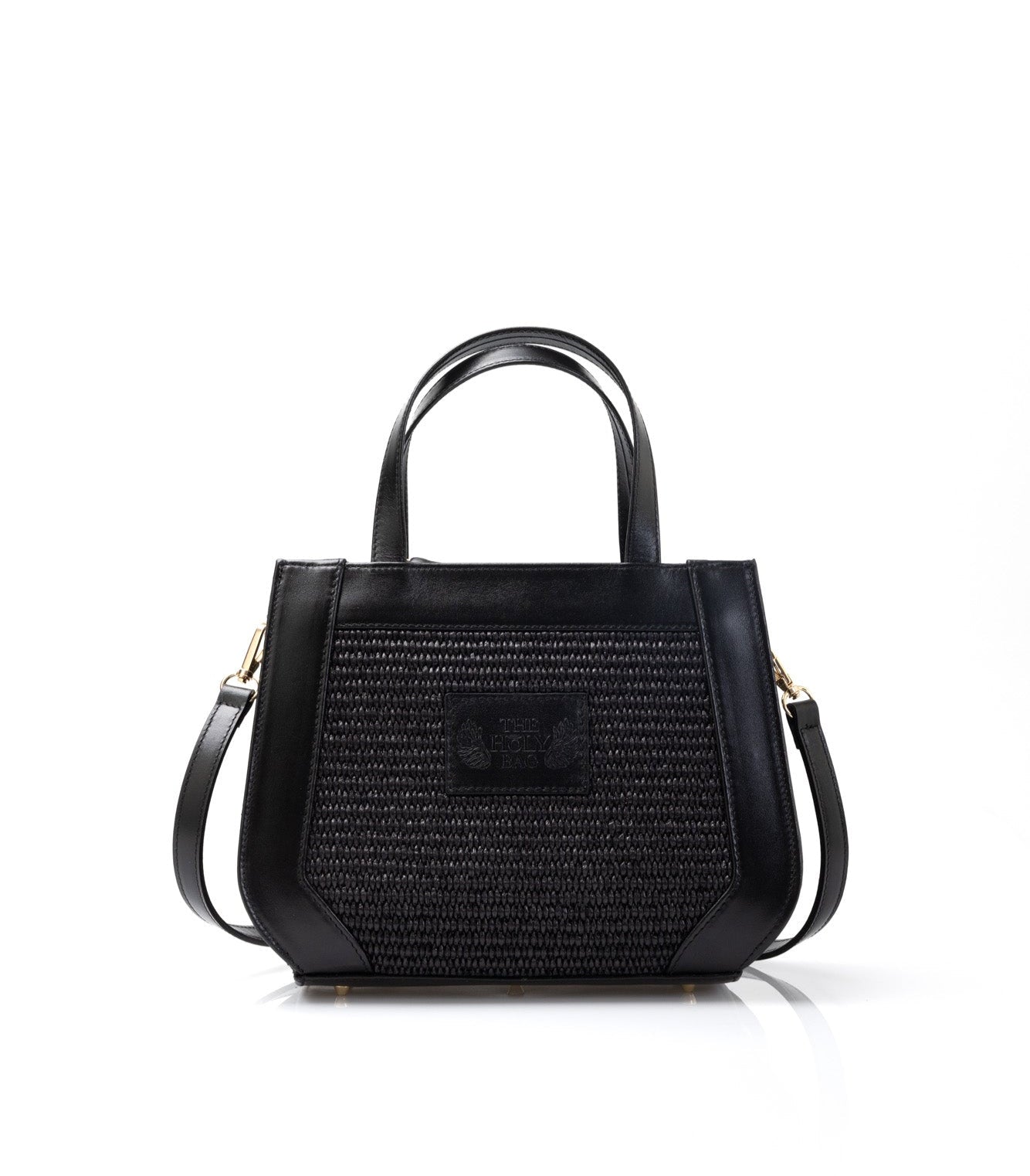TheHolyBag Γυναικεία τσάντα με ασύμμετρες γωνίες, από μαύρη ψάθα και μαύρο δέρμα με top handles και αποσπώμενο λουρακι ώμου. 