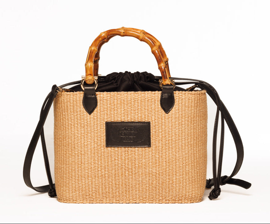 Shoulder Bag with bamboo top handles , Athena - The Holy Bag
TheHolyBag Τσάντα basket από φυσικό χρώμα ψάθα και μαύρο  δέρμα με χερούλια από αληθινό μπαμπού και βαμβακερό ριγέ πουγκί που σουρώνει επάνω με δερμάτινα κορδόνια.