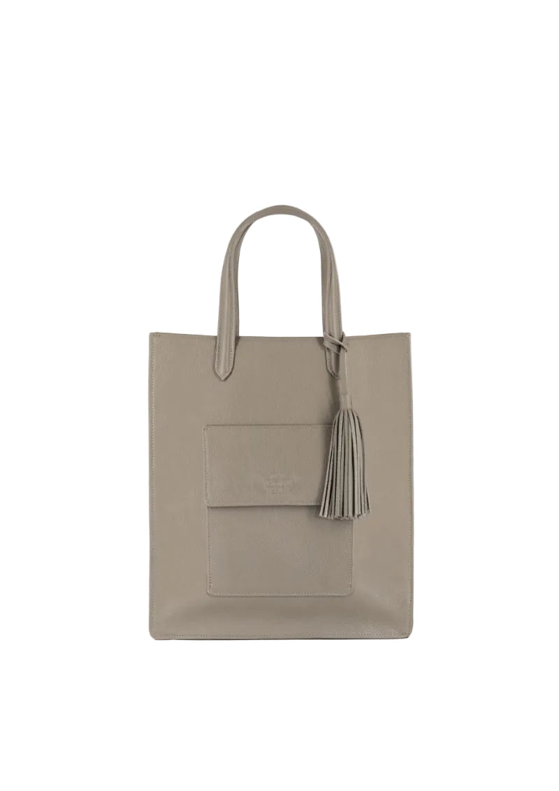 Achelois unisex leather tote bag with top handles, front flap pocket and detachable shoulder strap.