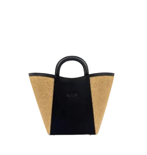 Shopper bag in natural color straw and black leather. Top handles, adjustable and detachable crossbody strap. One inner pocket, magnetic closure. The Holy Bag
Γυναικεία τσάντα shopper από μαύρο δερμα και ψάθα σε φυσικό χρώμα, με αποσπώμενο λουράκι ώμου, εσωτερική τσέπη, κλείσιμο με μαγνήτη. Theholybag