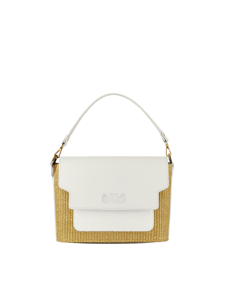 Handbag with white leather flap and  straw body. With an outer pocket, handle and a shoulder strap. The Holy Bag
Τσάντα ώμου-χειρός από ψάθα και λευκό δέρμα. Με καπάκι και εξωτερική τσέπη. Λουράκι χειρός και αποσπώμενο λουράκι ώμου The Holy Bag