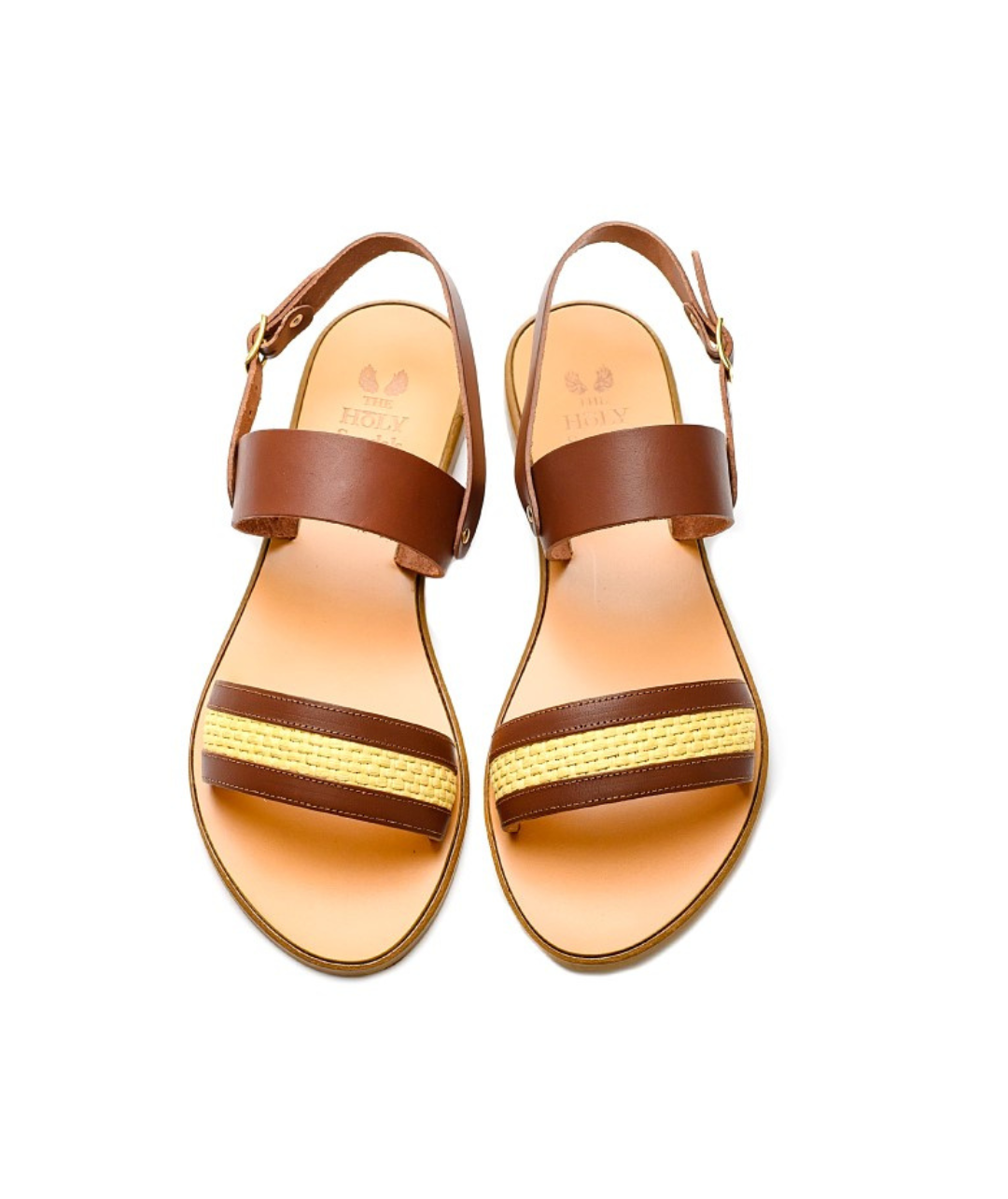 TheHolySandals Γυναικεία σανδάλια από δέρμα σε σκούρο καφέ χρώμα και ψάθα. Με διπλή φάσα και λεπτό λουράκι που κουμπώνει στον αστράγαλο.