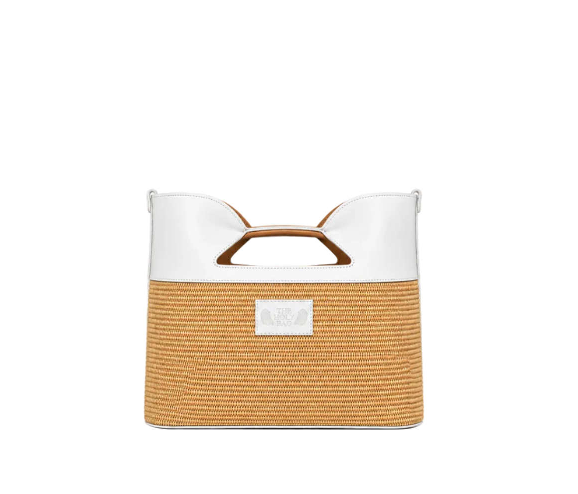 TheHolyBagΓυναικεία τσάντα tote από ψάθα και ταμπά δέρμα με επένδυση από χοιρινο δέρμα, εσωτερικές τσέπες και λουράκι ώμου.
Shopping bag in lime straw and camel vachetta leather with inner pocket and adjustable shoulder strap, Canis Major - The Holy Bag