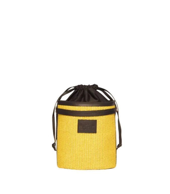 Bucket Bag in yellow straw with a drawstring pouch and black leather, Demetra. Adjustable shoulder strap.  The Holy Bag
Χειροποίητη γυναικεία τσάντα καλάθι από ψάθα σε κίτρινο χρώμα, με μαύρο δέρμα και βαμβακερό πουγκί. Φοριέται με λουράκι ώμου που αυξομειώνεται.
theholybag