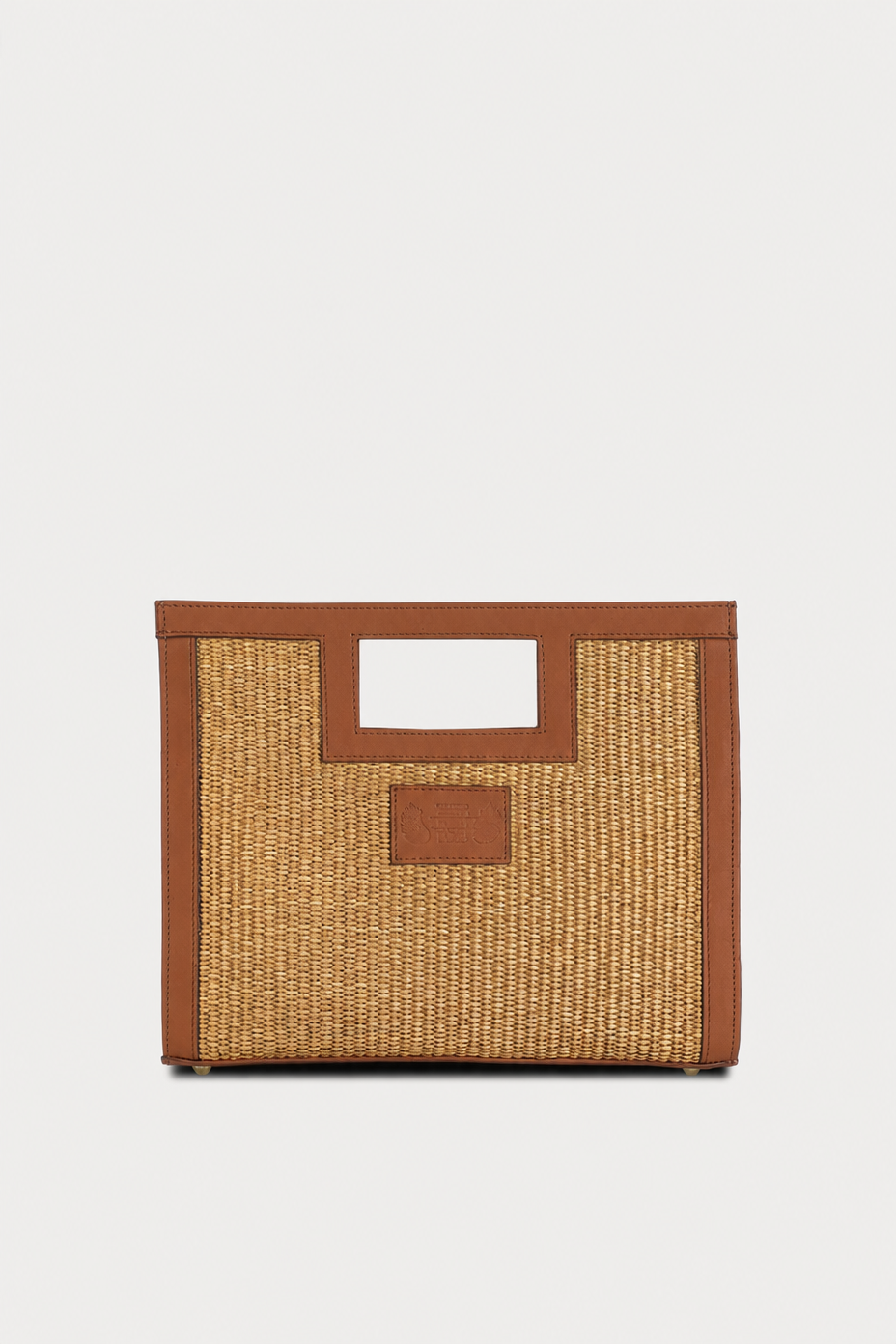 Draco small in natural straw and tabac leather with an adjustable shoulder strap