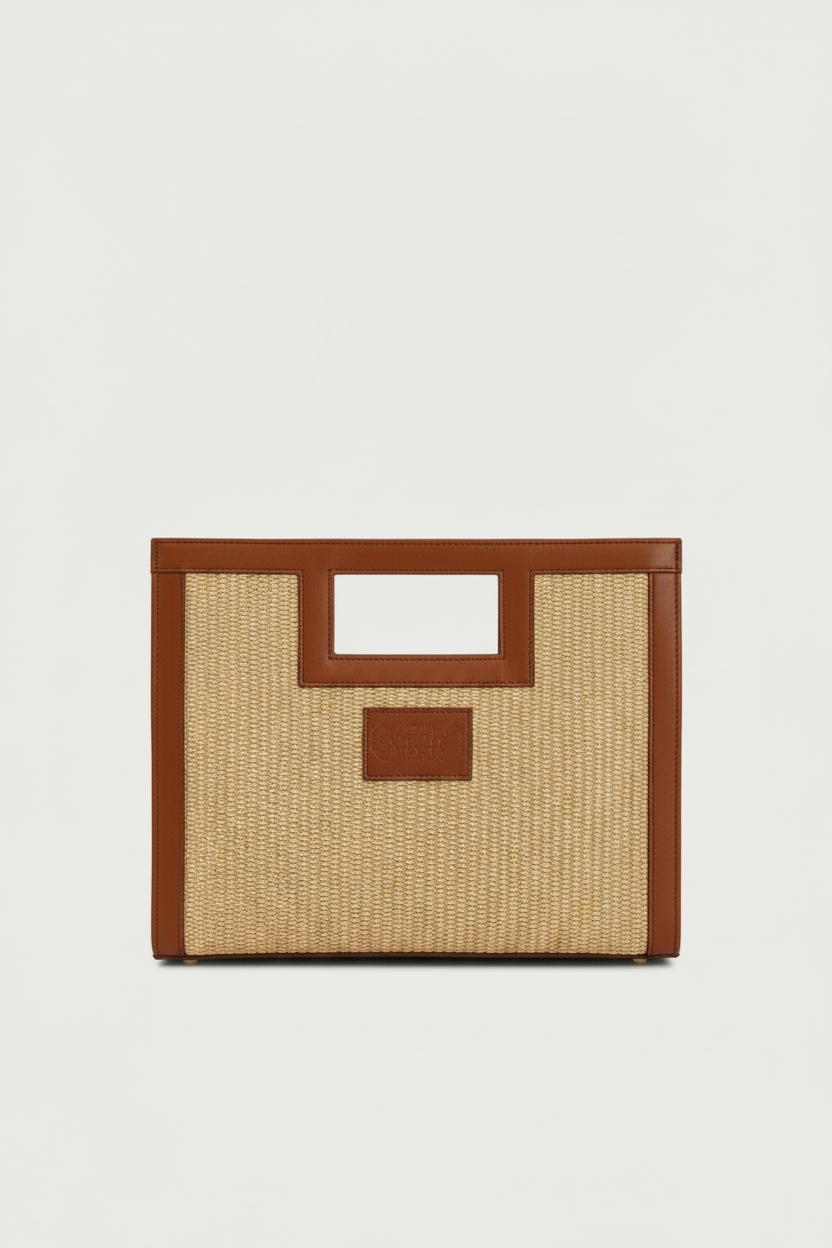 Square bag with square handle in straw and tobacco leather, with inner pocket and a shoulder strap 
The Holy Bag
Τσάντα από ψάθα και ταμπά δέρμα με τετράγωνη λαβή και αποσπώμενο λουράκι ώμου. The Holy Bag
