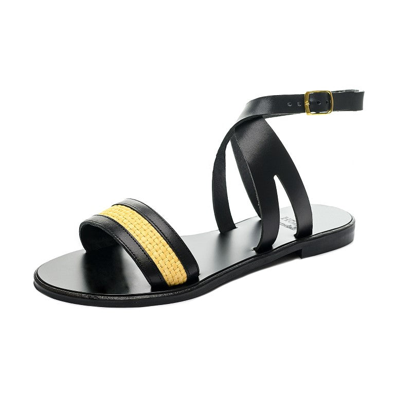 TheHolySandals Σανδάλια από ψάθα και μαύρο δέρμα, με φάσα μπροστά και χιαστί λουράκια με σχέδιο, που δένουν στον αστράγαλο.