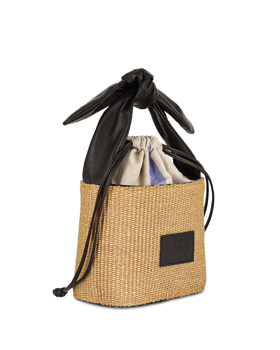 Woven drawstring bag with black drawstring and visible brand label on a white background