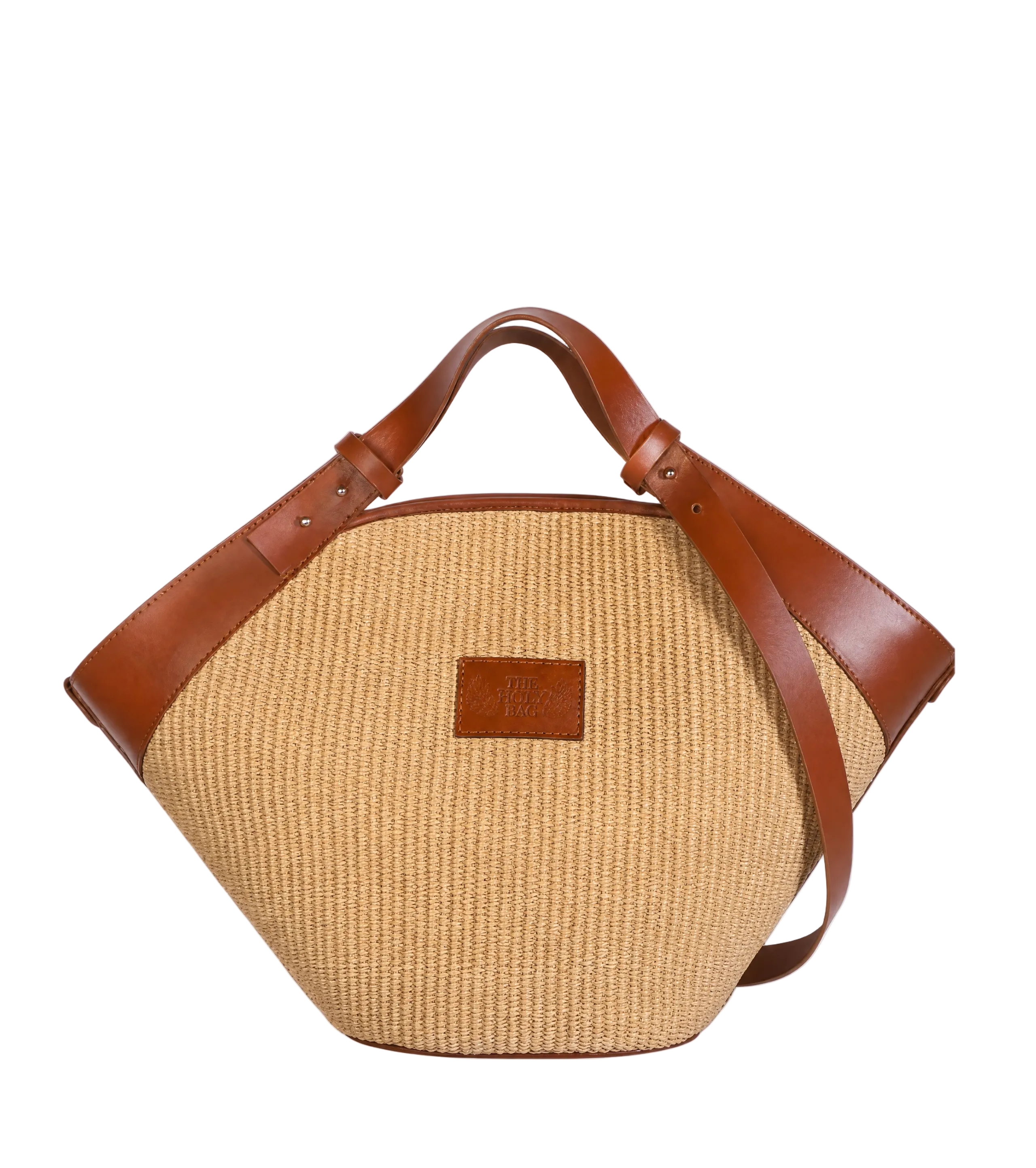 Shopper bag in straw and tobacco vachetta leather, in adjustable handle / shoulder strap. Inner pocket, magnetic closure. The Holy Bag.
Τσάντα shopper από ψάθα και ταμπά δέρμα βακέτα, με πτυσσόμενο λουράκι.  Με εσωτερική τσέπη. Κλείνει με μαγνήτη. The Holy Bag.