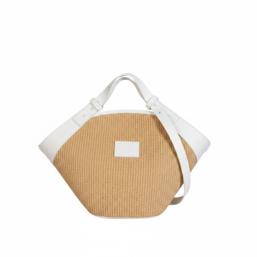 Shopper bag in straw and leather, in adjustable handle / shoulder strap. Inner pocket, magnetic closure. The Holy Bag.
Τσάντα shopper από ψάθα και ταμπά δέρμα βακέτα, με πτυσσόμενο λουράκι.  Με εσωτερική τσέπη. Κλείνει με μαγνήτη. The Holy Bag.