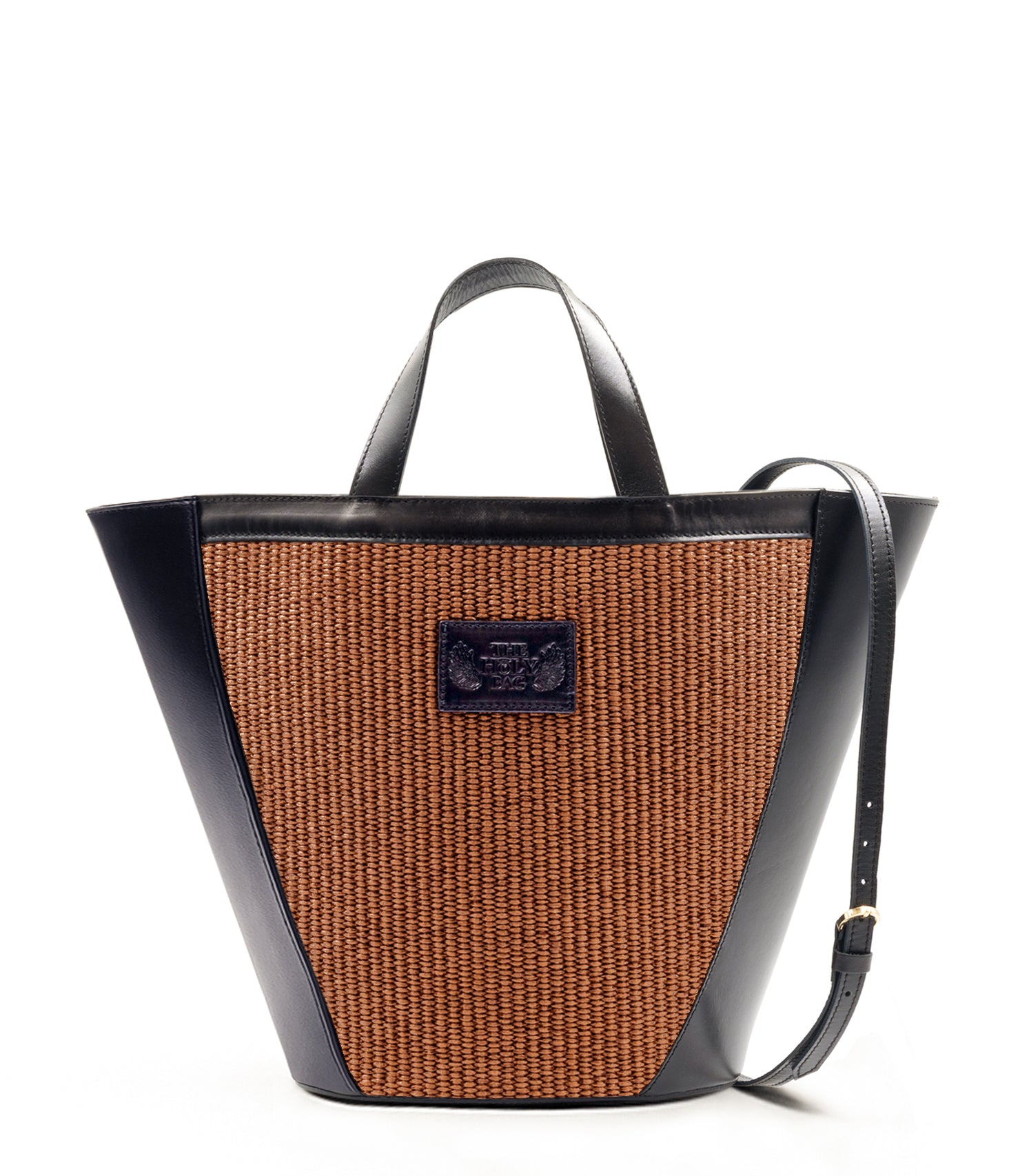 Rea shopping bag in marrone straw and black leather. With two top handles and a shoulder strap. TheHolyBag
Τσάντα shopper απο καφέ ψάθα και μαύρο δέρμα. Με λαβές χειρός, εσωτερική τσέπη και λουράκι ώμου.
The Holy Bag