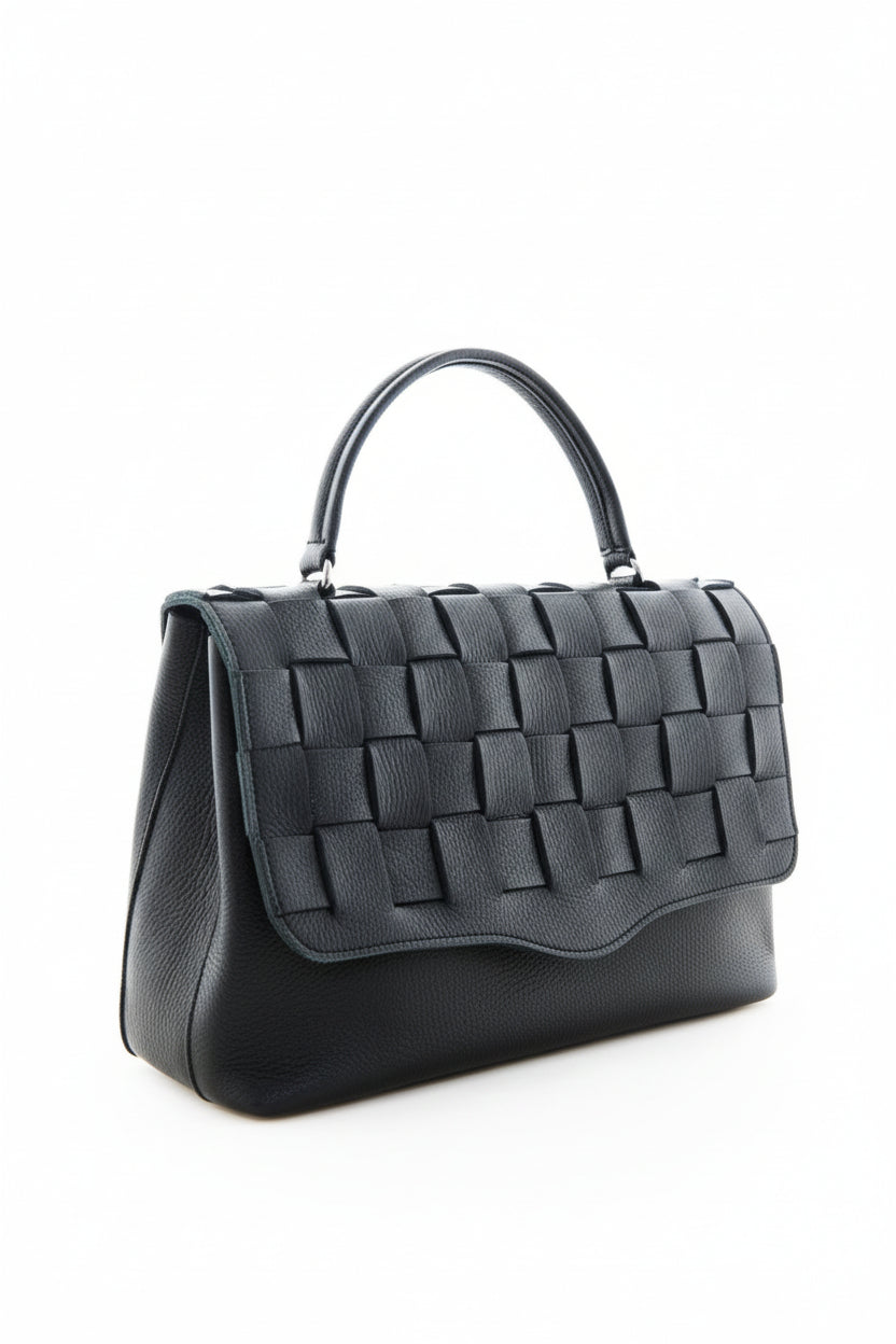 TERPSICHORE - The Holy Bag  handmade knitted leather tote bag coated with suede inner flap, handle and adjustable shoulder strap.
Χειροποίητη τσάντα από δέρμα με πλεκτό καπάκι, λαβή χειρός, λουράκι ώμου και εσωτερική τσέπη με φερμουάρ.