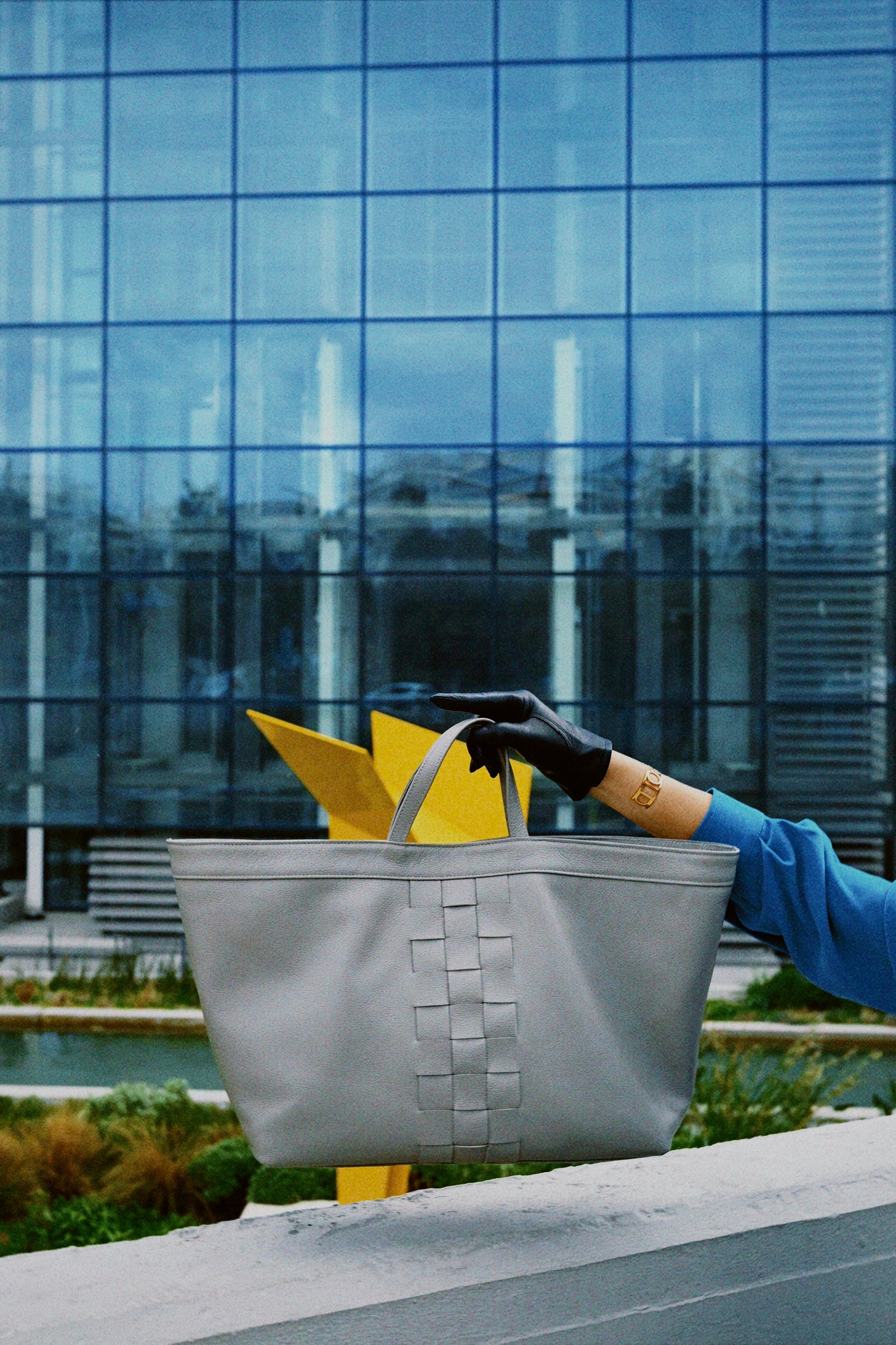 The Holy Bag - Urania leather shopper bag in knitted detail in front, handles and a shoulder strap. Coated in pork leather and a leather pocket with zipper.