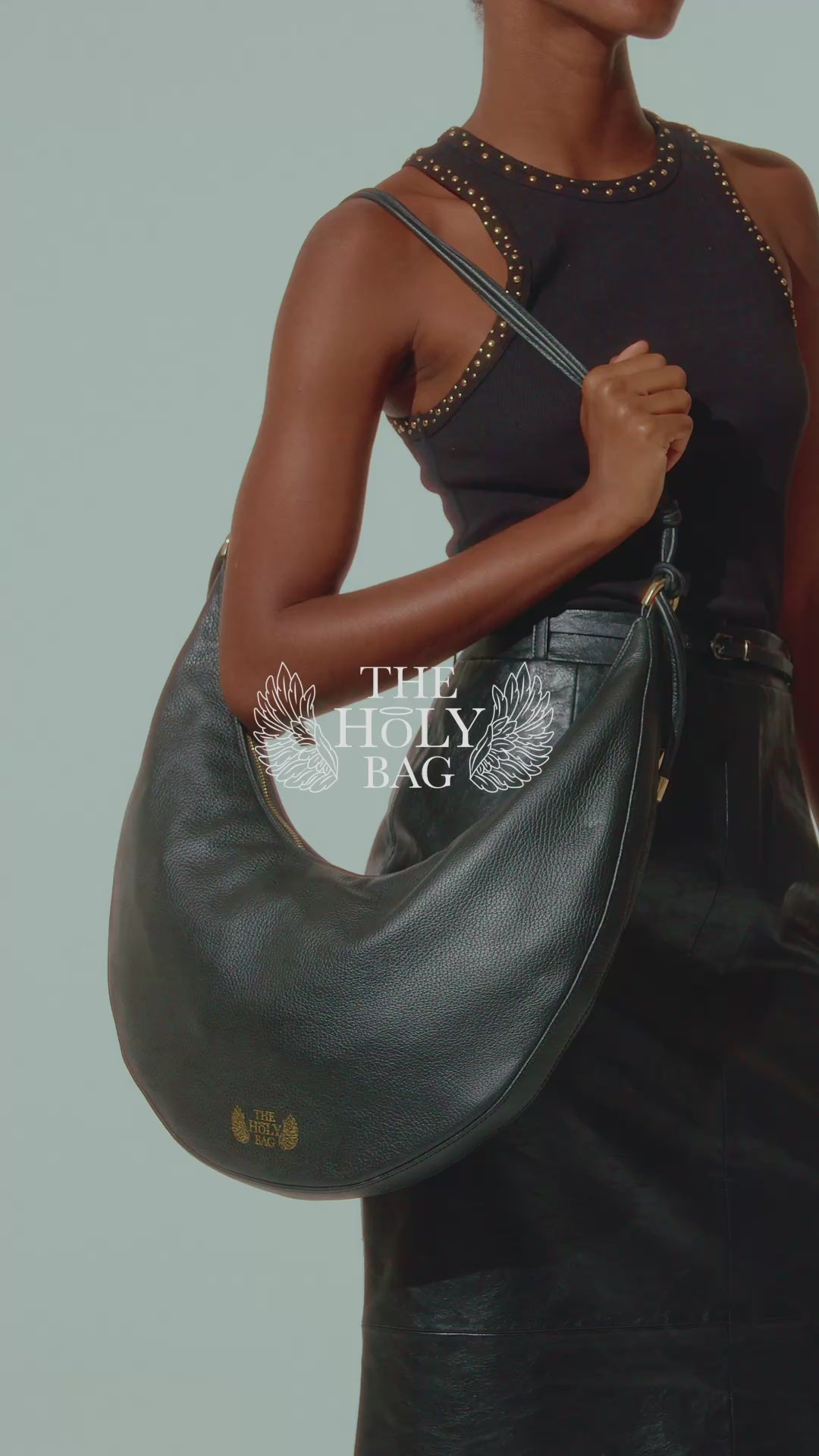 The Holy Bag Leather hobo bag in burgundy color with zipper closure, Sophia, video