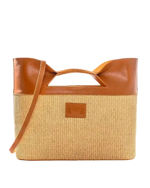 TheHolyBagΓυναικεία τσάντα tote από ψάθα και ταμπά δέρμα με επένδυση από χοιρινο δέρμα, εσωτερικές τσέπες και λουράκι ώμου.