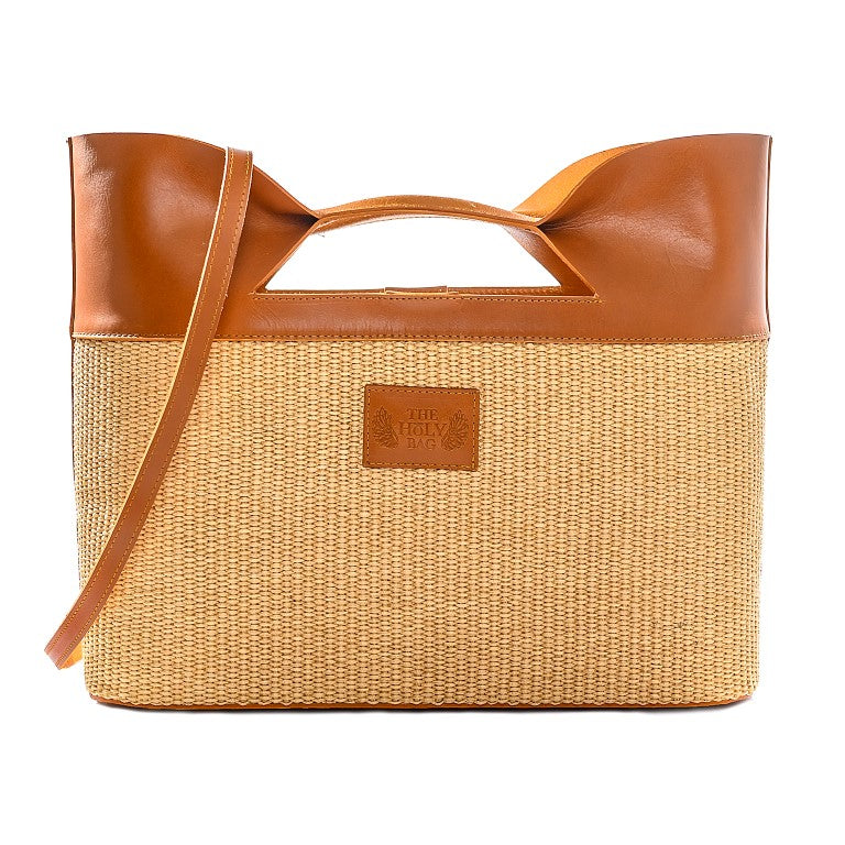 TheHolyBagΓυναικεία τσάντα tote από ψάθα και ταμπά δέρμα με επένδυση από χοιρινο δέρμα, εσωτερικές τσέπες και λουράκι ώμου.